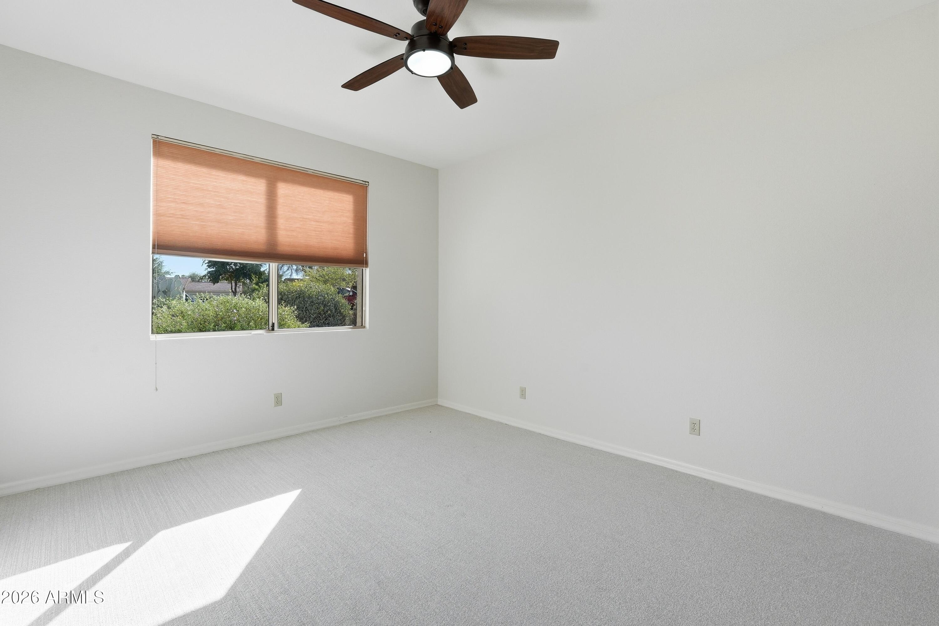 18602 Amarado Circle Rio Verde, AZ 85263 - Photo 31 of 58 an empty room with a window