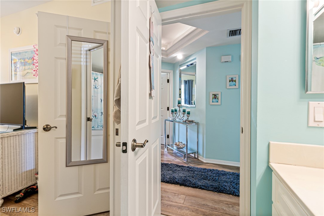 1799 Four Mile Cove Parkway, Unit 925 Cape Coral, FL 33990 - Photo 35 of 49 a view of a bedroom from hallway