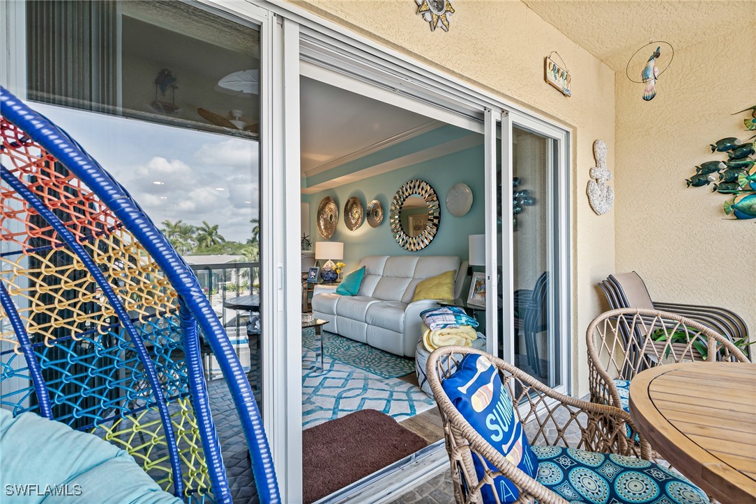 1799 Four Mile Cove Parkway, Unit 925 Cape Coral, FL 33990 - Photo 38 of 49 a view of an outdoor space with seating area