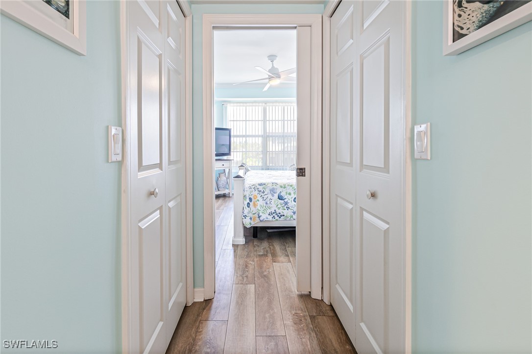1799 Four Mile Cove Parkway, Unit 925 Cape Coral, FL 33990 - Photo 41 of 49 a view of bedroom with wooden floor