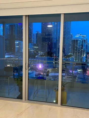 a view of balcony with furniture