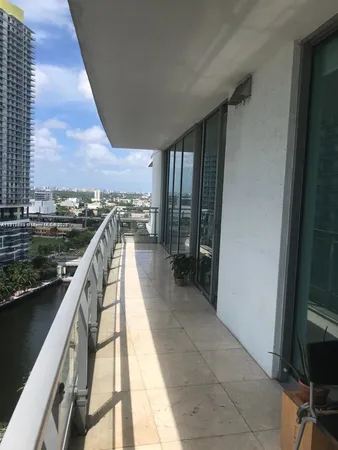 a view of swimming pool with outside seating