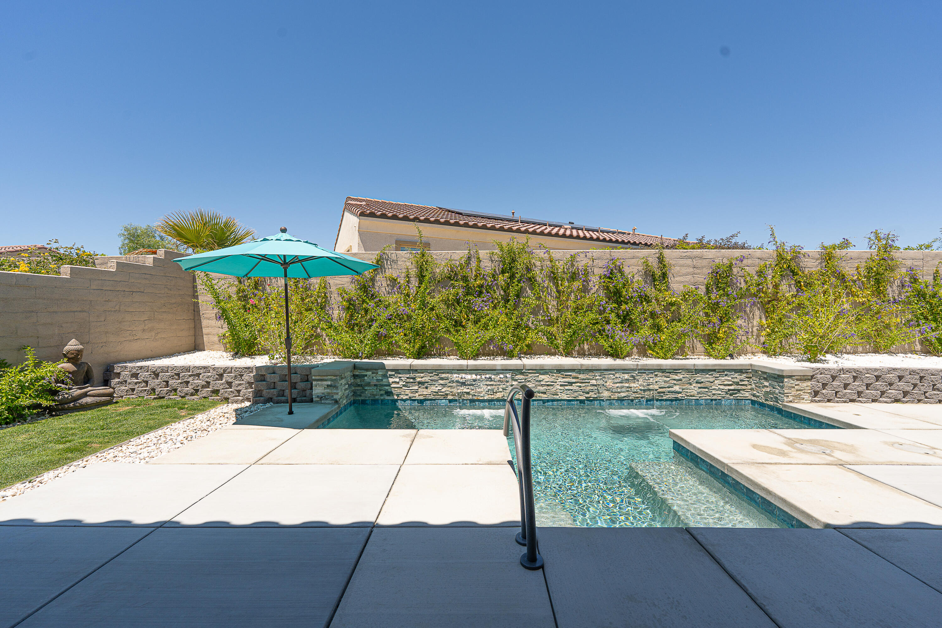 18 Vintage Rancho Mirage, CA 92270 - Photo 4 of 54 a view of a swimming pool with a yard