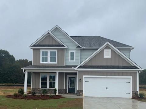 123 Queens Cemetery Road Good Hope, GA 30641 - Photo 1 of 1 a front view of a house with yard