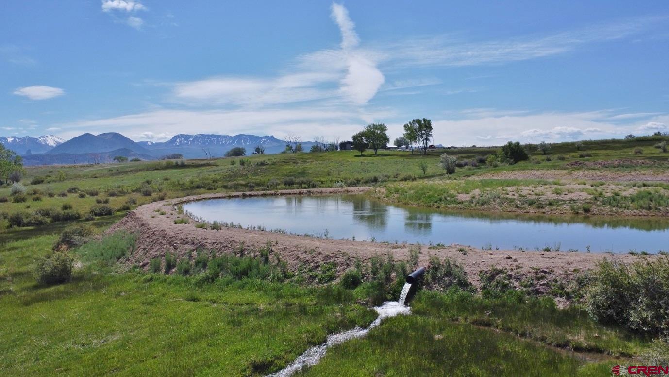 Tbd Grandview Mesa Road Crawford, CO 81415 - Photo 6 of 33 a view of a lake with houses in the back