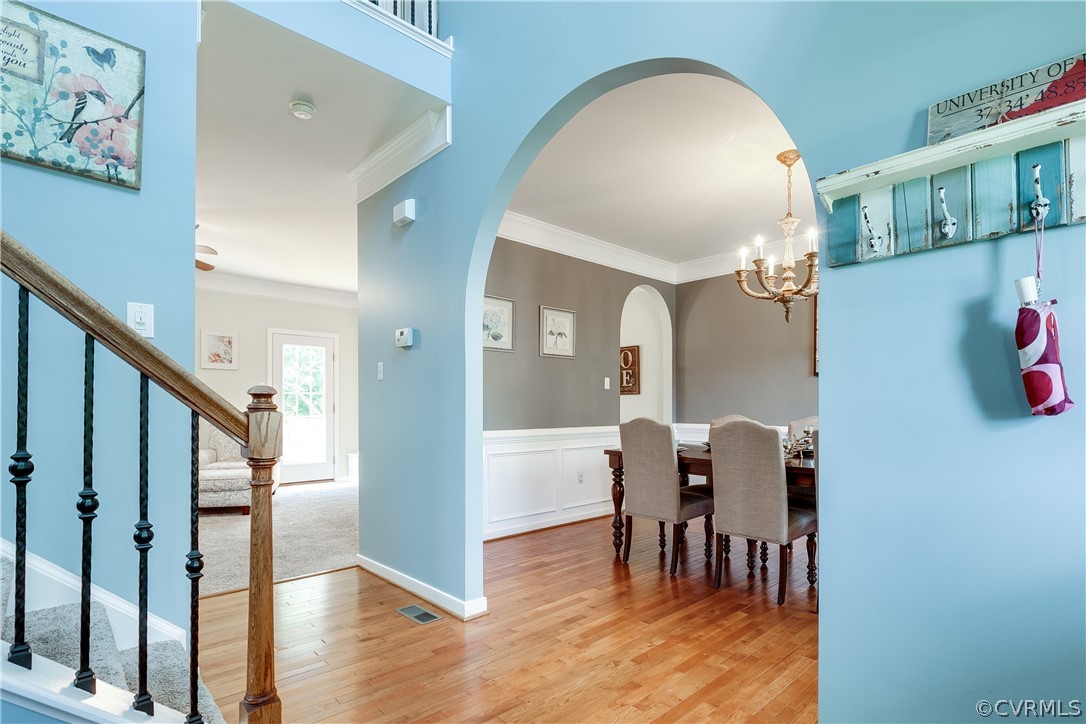 9518 Dunroming Road Chesterfield, VA 23832 - Photo 3 of 47 a view of a dining room with furniture and wooden floor