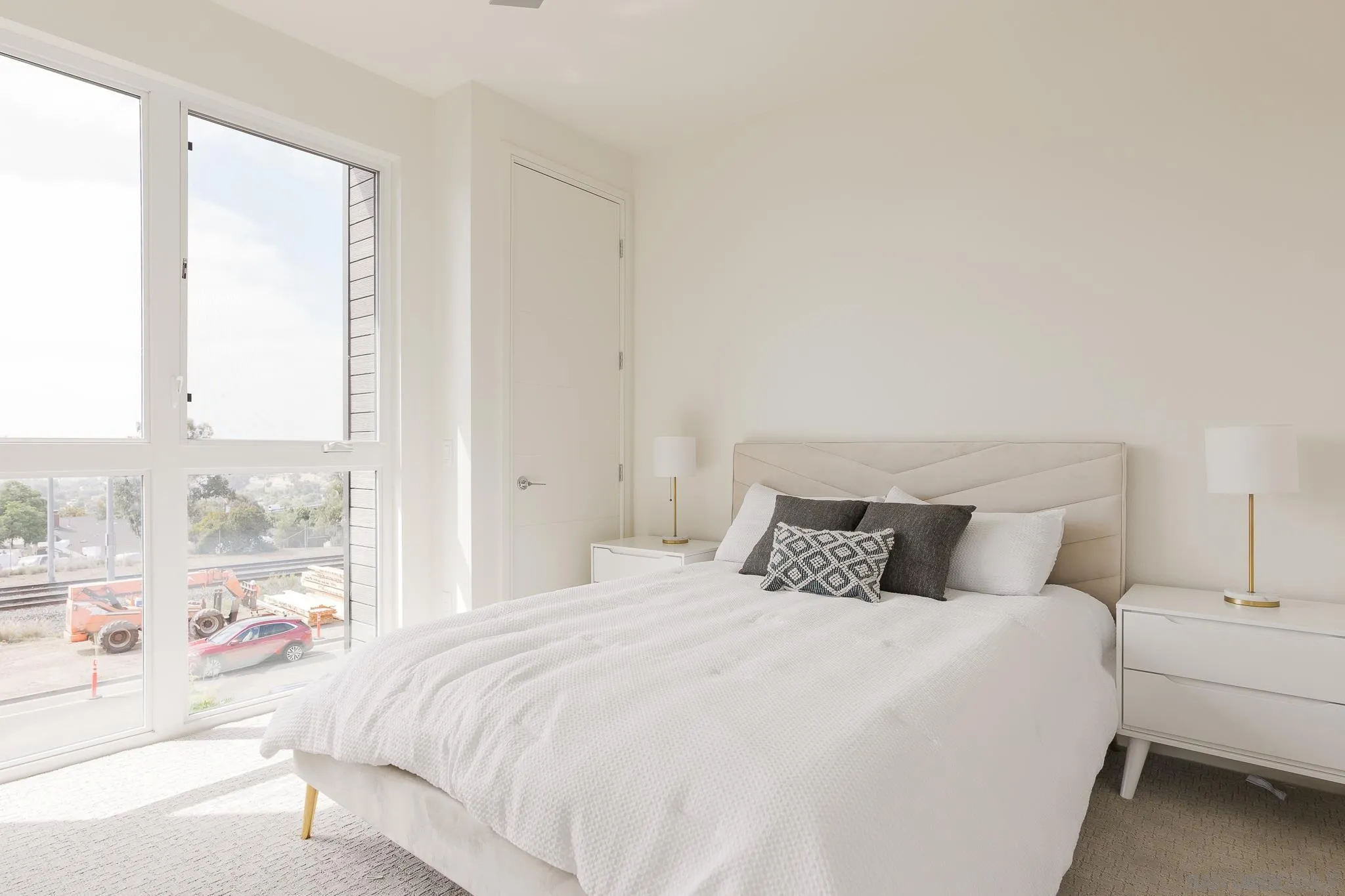 8286 High Street La Mesa, CA 91941 - Photo 13 of 27 a bedroom with a large bed and a large window