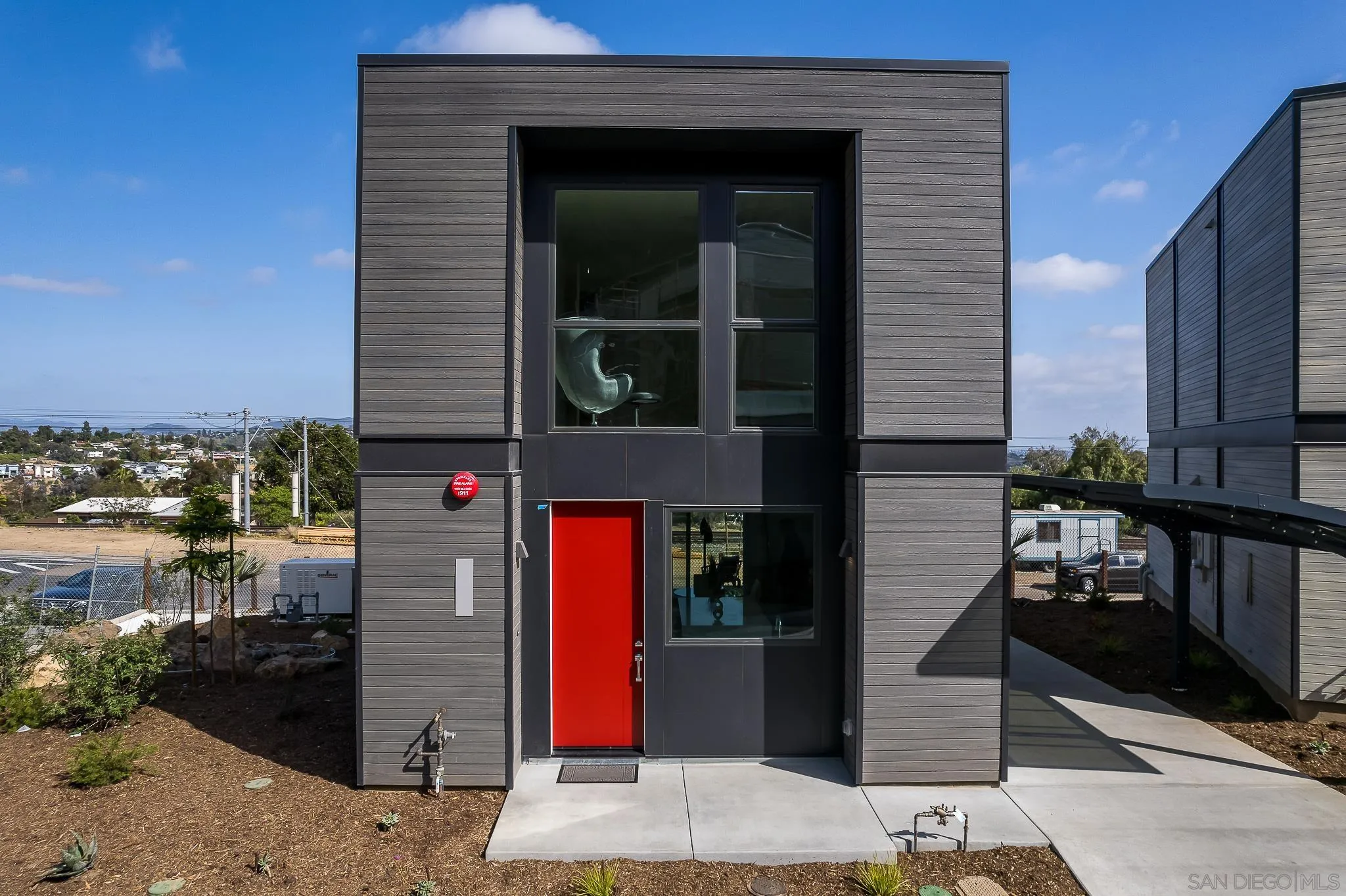 8286 High Street La Mesa, CA 91941 - Photo 25 of 27 a front view of a house with a yard