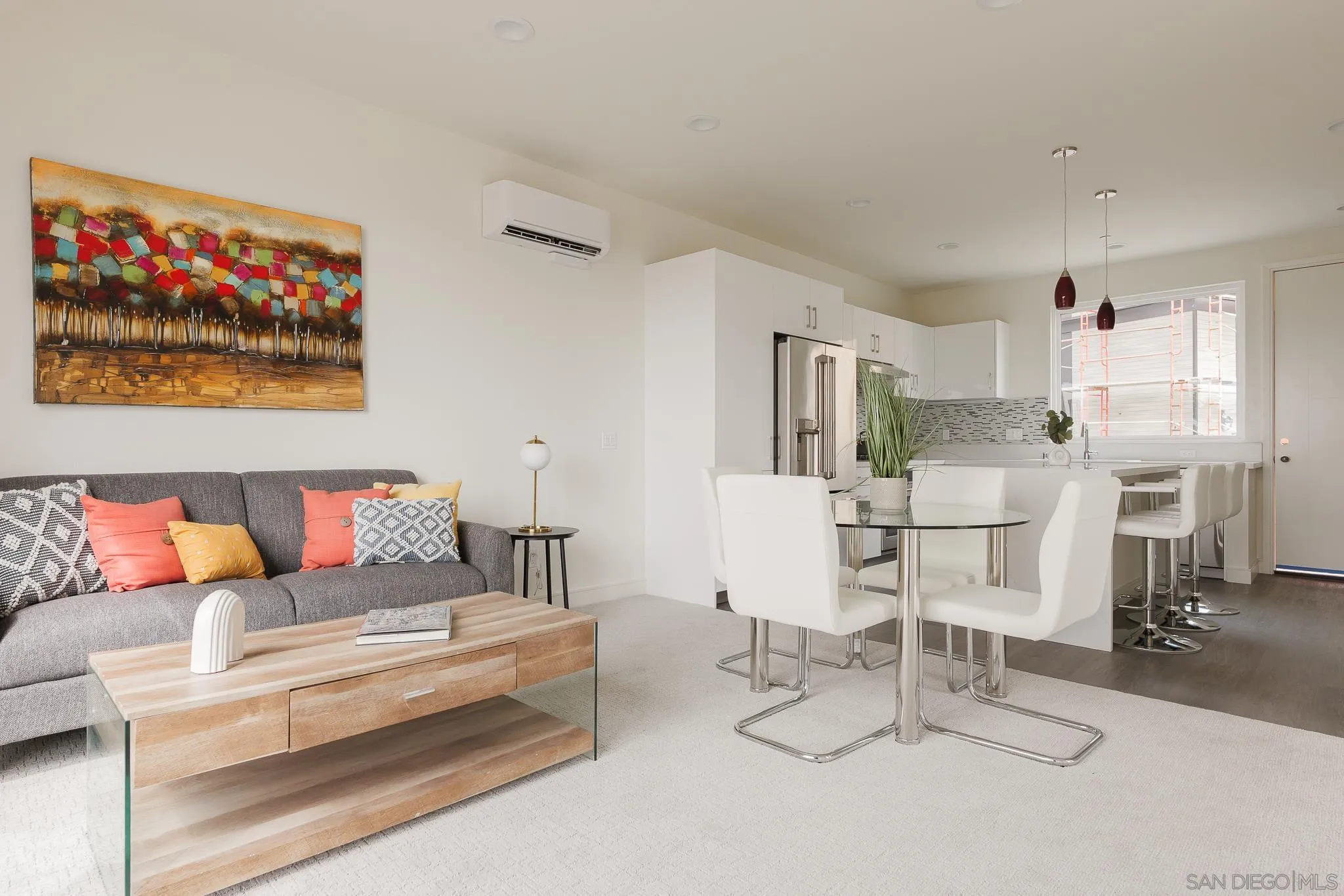 8286 High Street La Mesa, CA 91941 - Photo 5 of 27 a living room with furniture and kitchen view