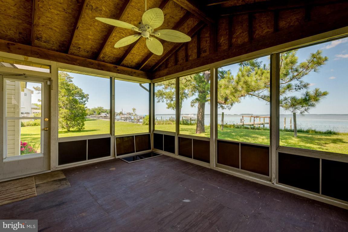 916 Long Point Road Grasonville, MD 21638 - Photo 12 of 27 Screened Porch with Fan and Cable TV hook up