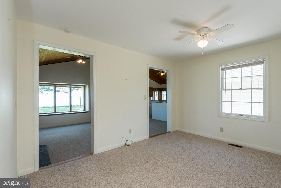 916 Long Point Road Grasonville, MD 21638 - Photo 13 of 27 Step Up from LR to Den