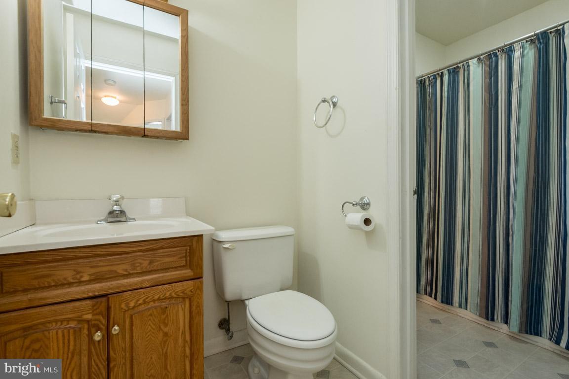 916 Long Point Road Grasonville, MD 21638 - Photo 18 of 27 Hall Bath with Shared Access to Tub/Shower