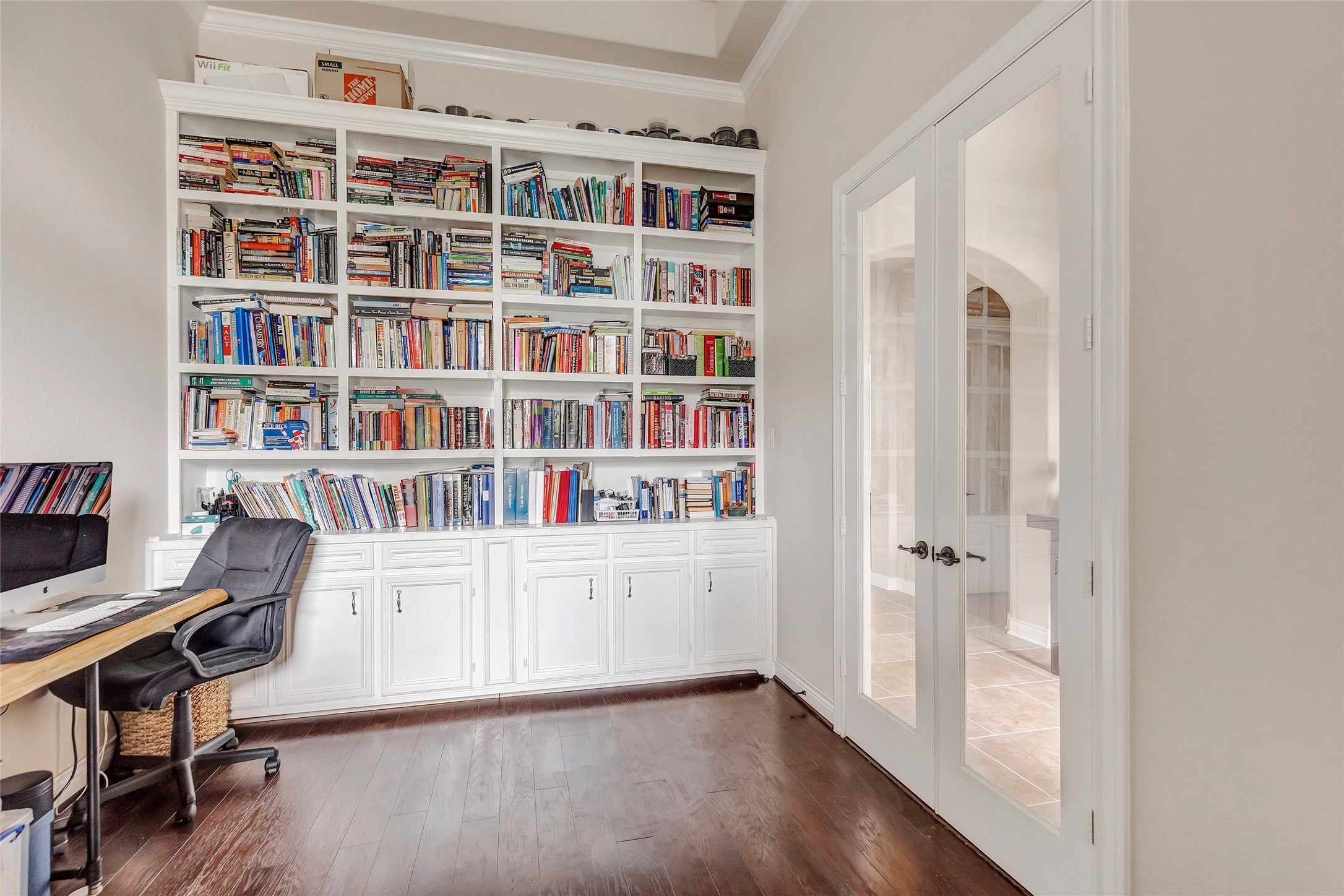 18115 Stari Most Lane Houston, TX 77044 - Photo 13 of 35 a view of a workspace with furniture and wooden floor