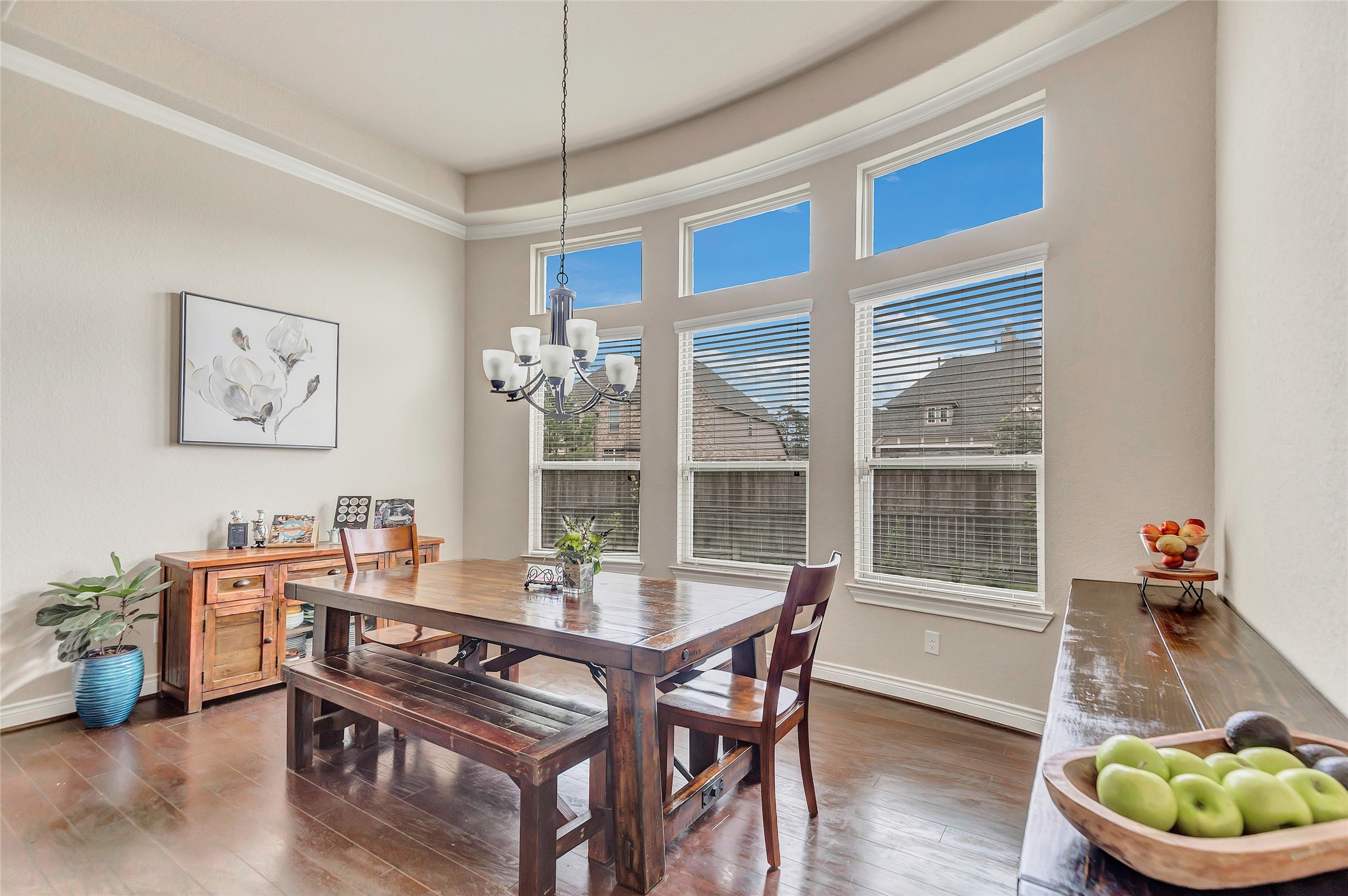 18115 Stari Most Lane Houston, TX 77044 - Photo 18 of 35 a dining room with wooden floor and a window