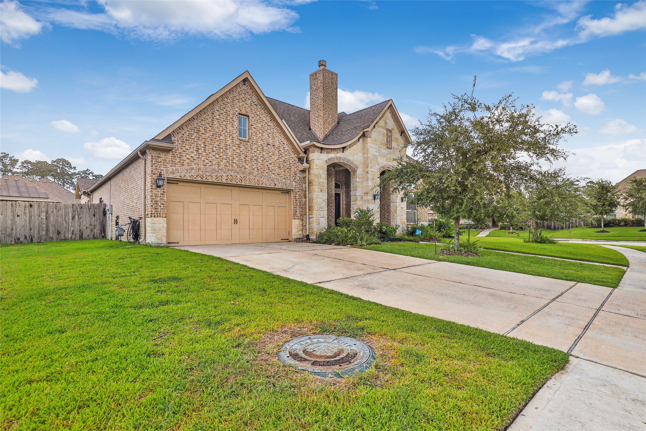 18115 Stari Most Lane Houston, TX 77044 - Photo 2 of 35 a house view with a garden space