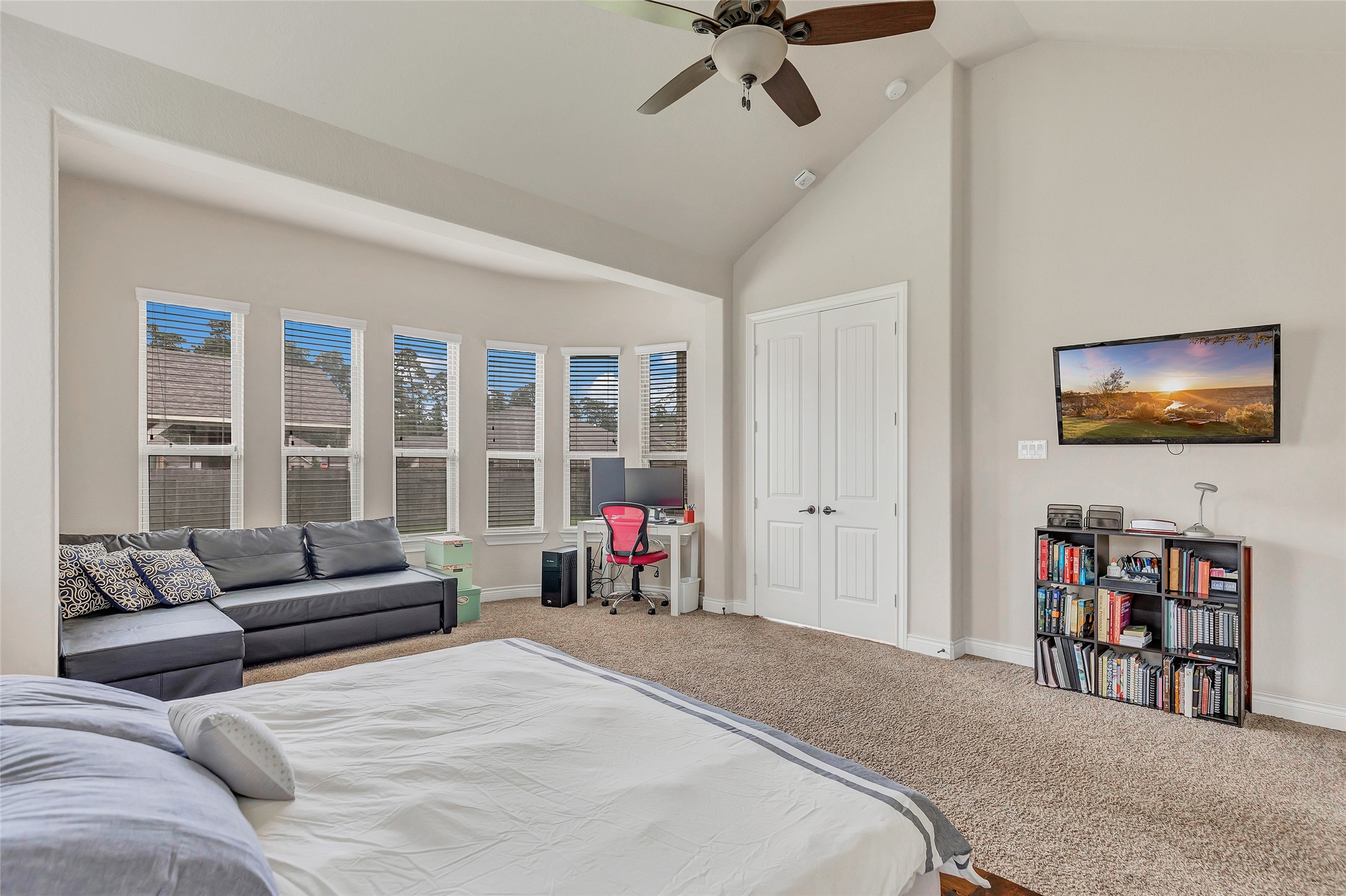 18115 Stari Most Lane Houston, TX 77044 - Photo 21 of 35 a bedroom with furniture and a flat screen tv