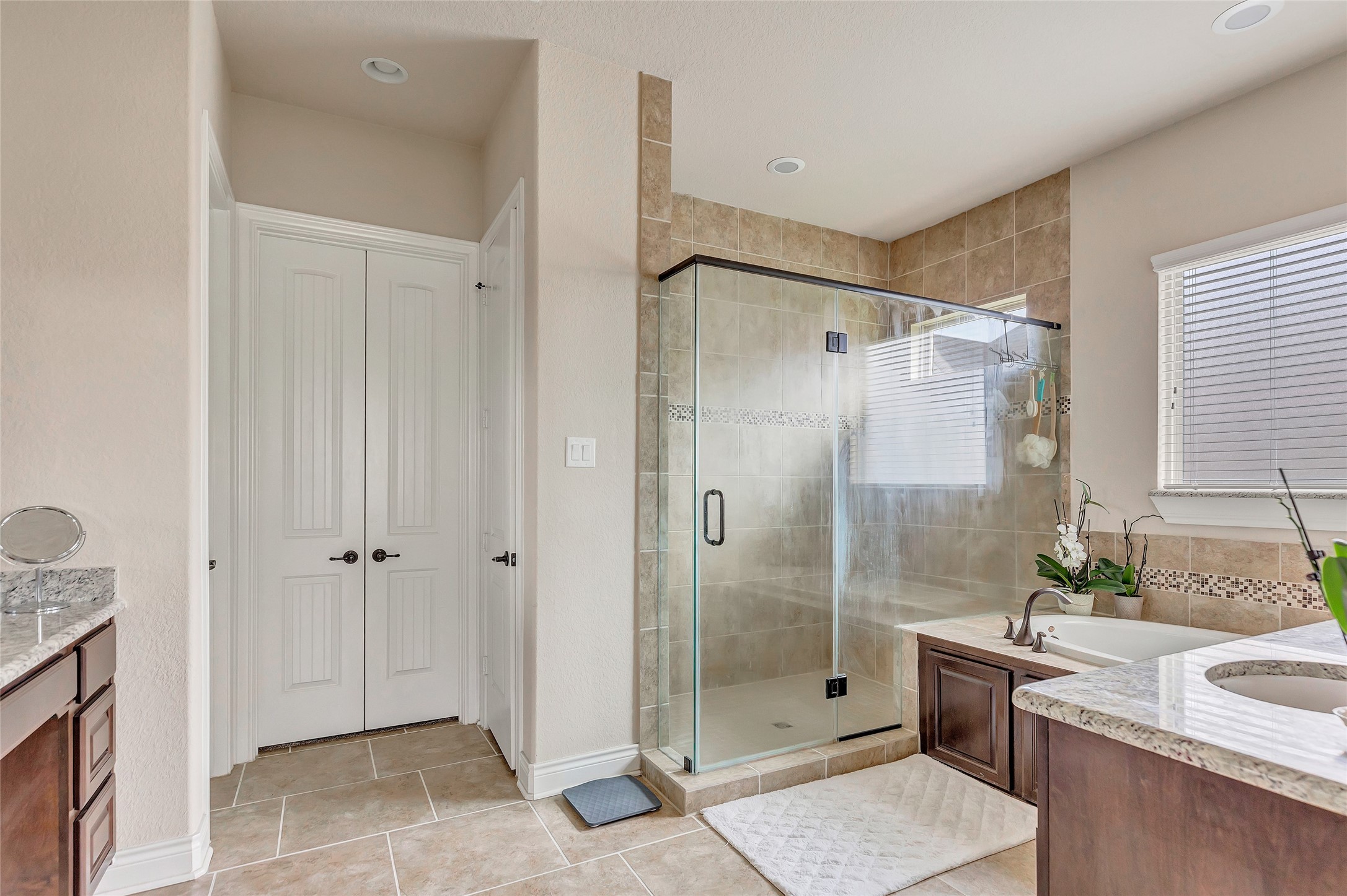 18115 Stari Most Lane Houston, TX 77044 - Photo 22 of 35 a bathroom with a shower and a sink