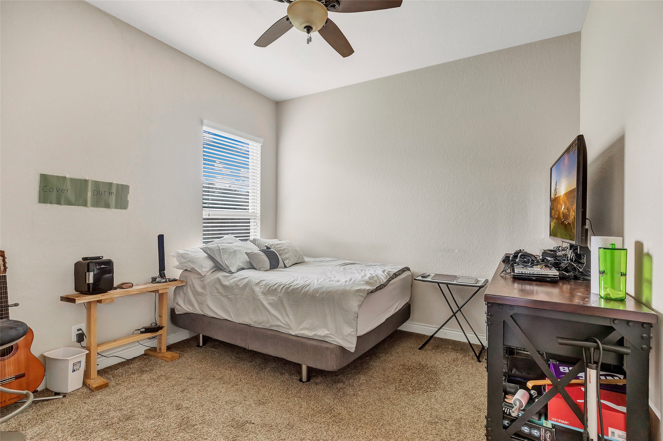 18115 Stari Most Lane Houston, TX 77044 - Photo 25 of 35 a bedroom with a bed and a tv