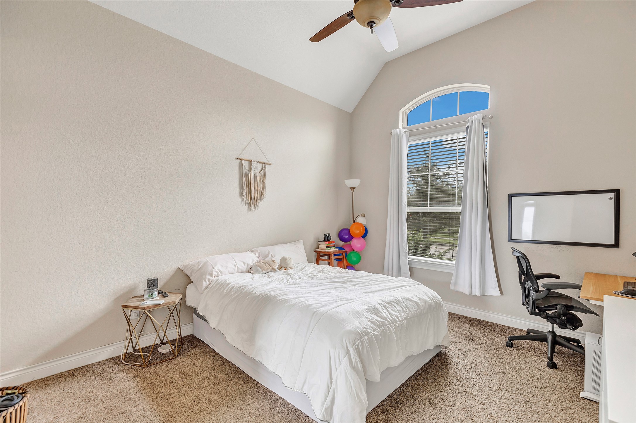 18115 Stari Most Lane Houston, TX 77044 - Photo 28 of 35 a bedroom with a bed and a desk