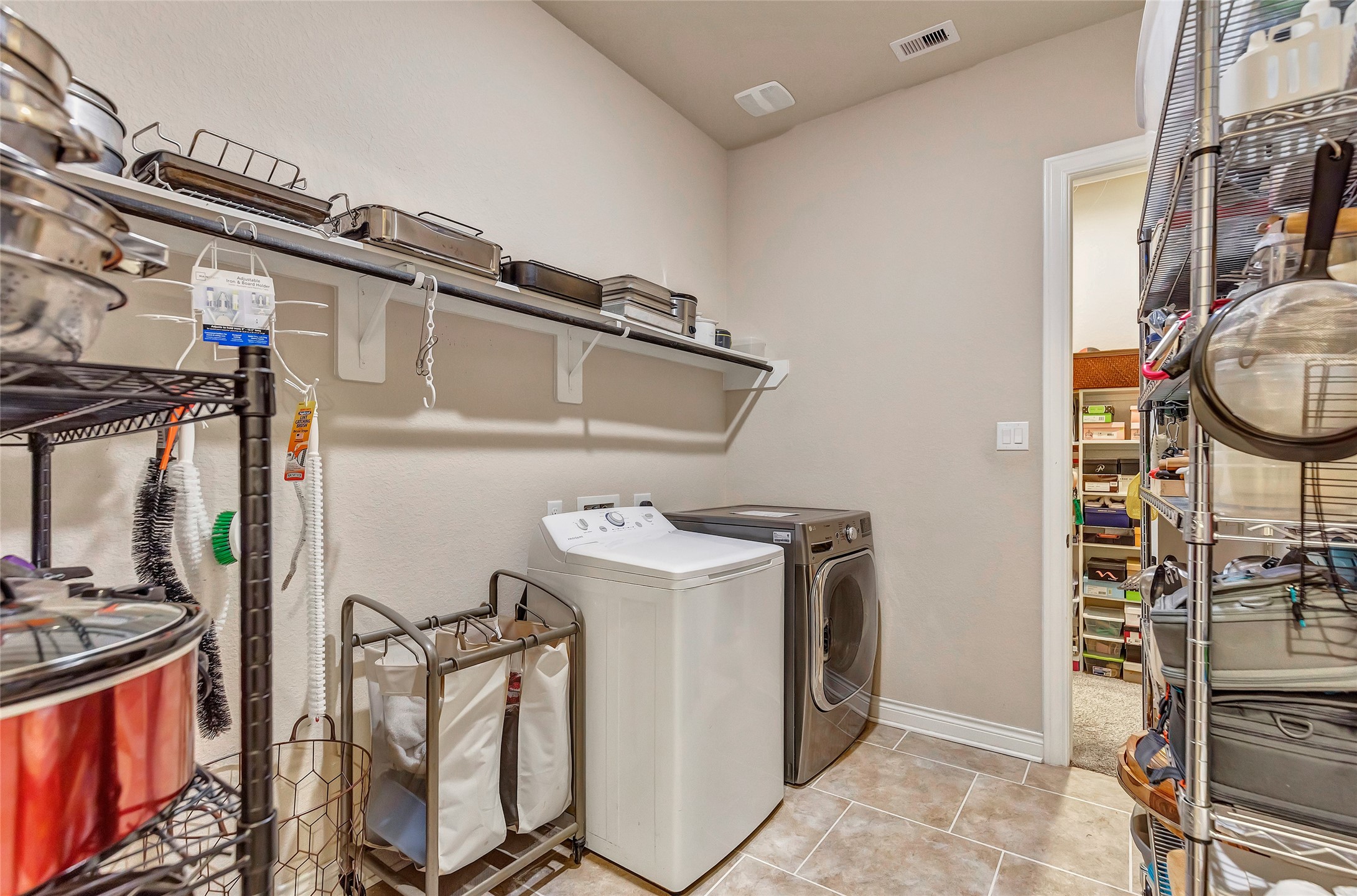 18115 Stari Most Lane Houston, TX 77044 - Photo 30 of 35 a utility room with dryer and washer