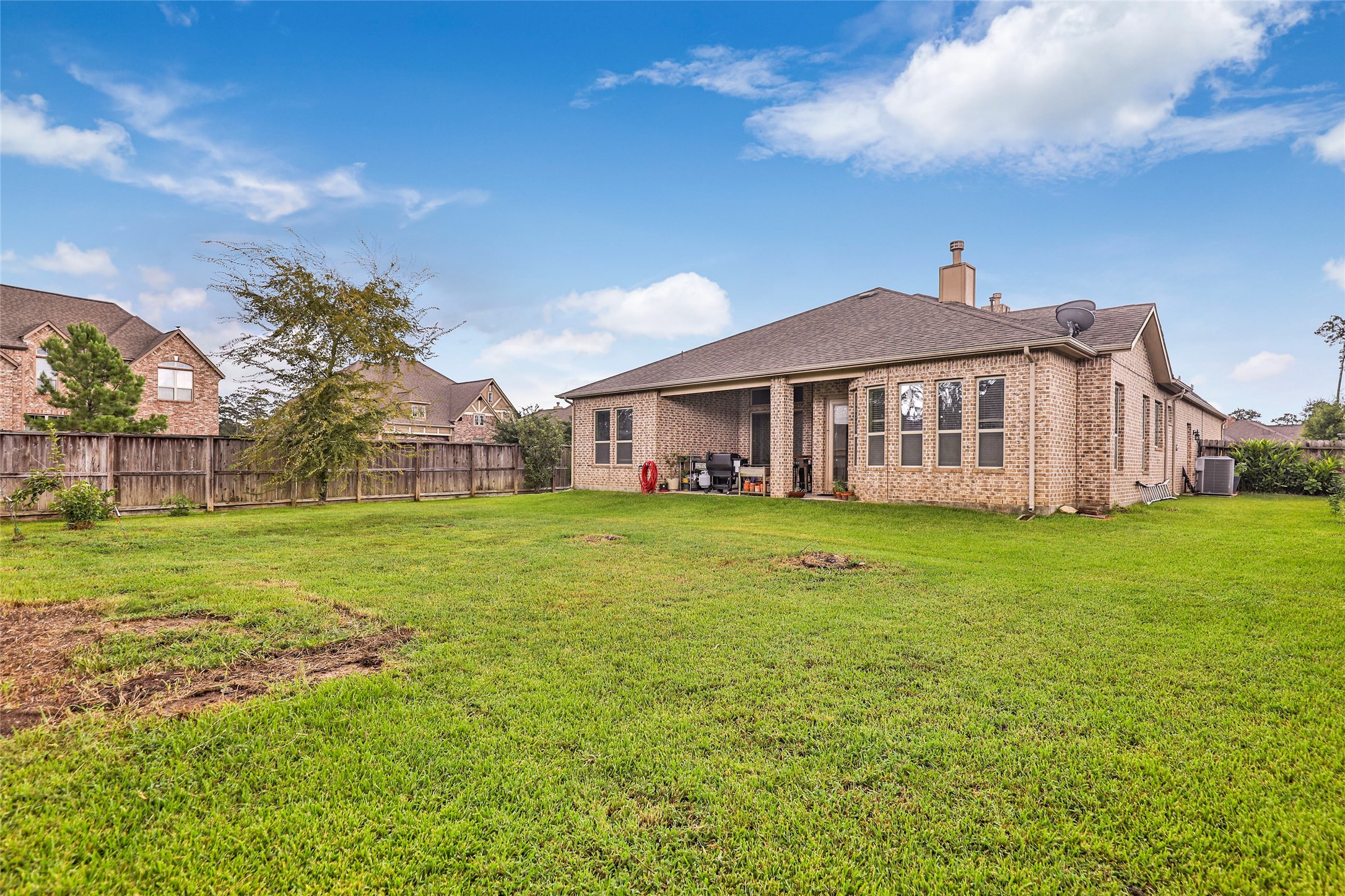 18115 Stari Most Lane Houston, TX 77044 - Photo 32 of 35 a view of a house with a big yard