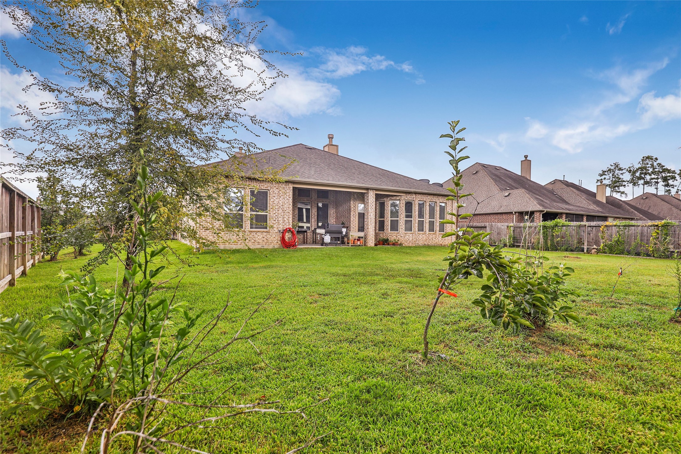 18115 Stari Most Lane Houston, TX 77044 - Photo 33 of 35 a house view with a garden space