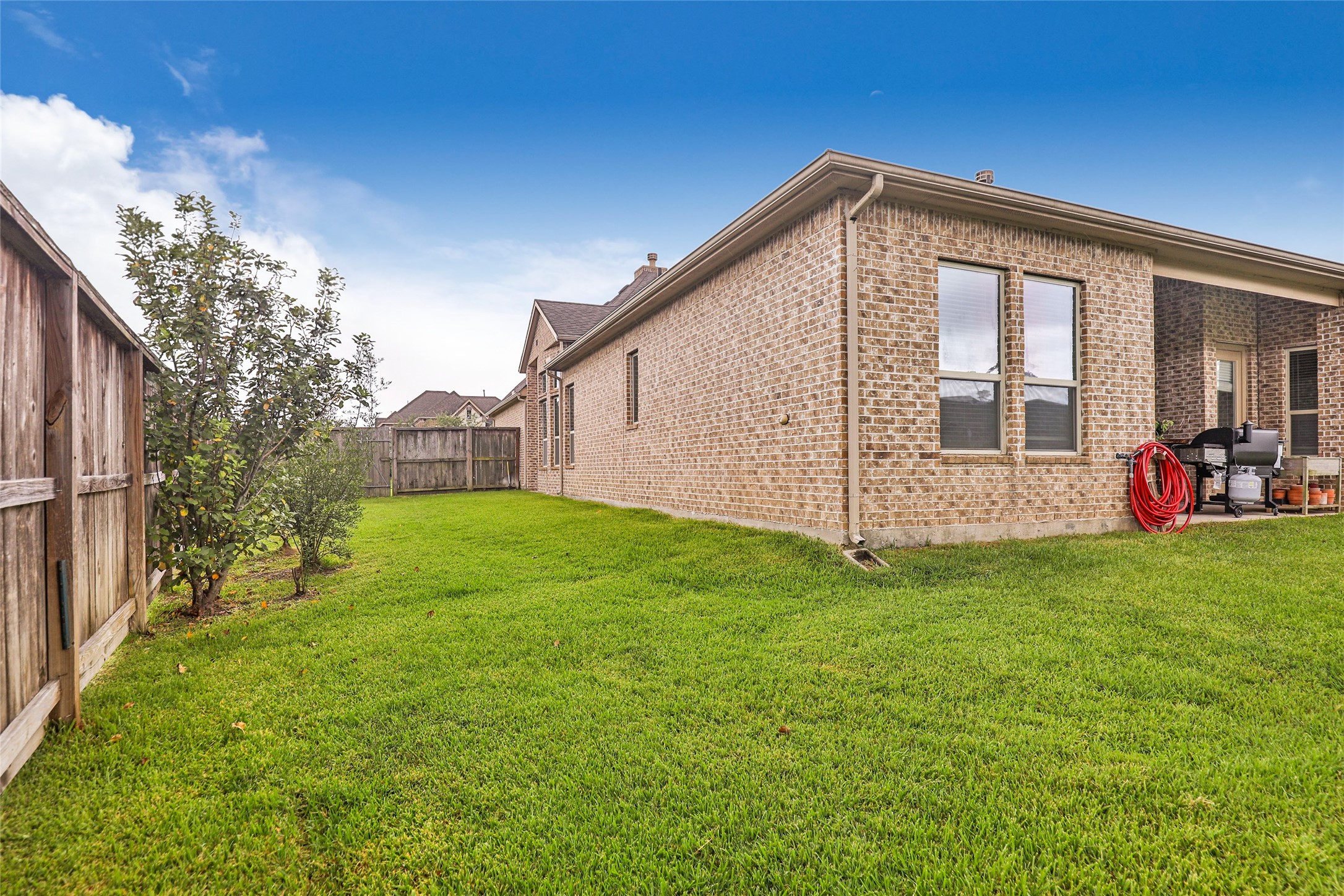 18115 Stari Most Lane Houston, TX 77044 - Photo 34 of 35 a view of a house with backyard