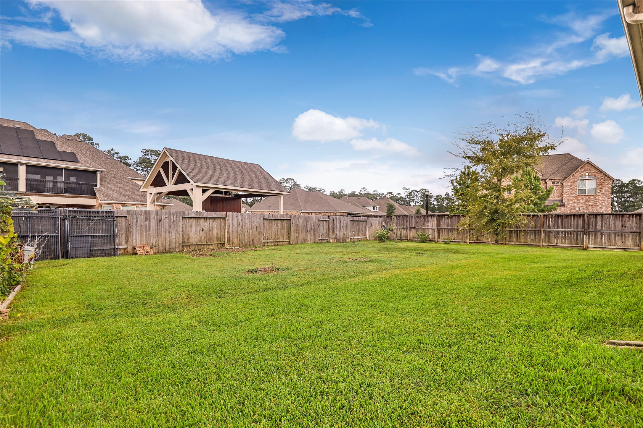 18115 Stari Most Lane Houston, TX 77044 - Photo 35 of 35 a backyard of a house with lots of green space