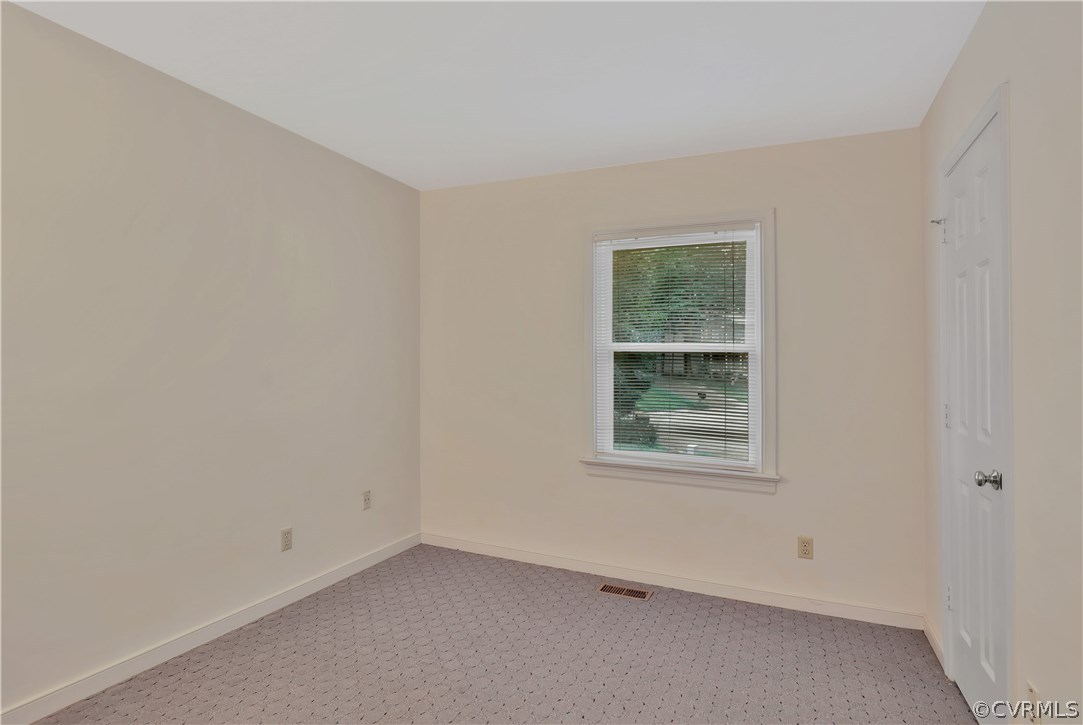 14602 Ridge Point Drive Midlothian, VA 23112 - Photo 21 of 25 an empty room with a window