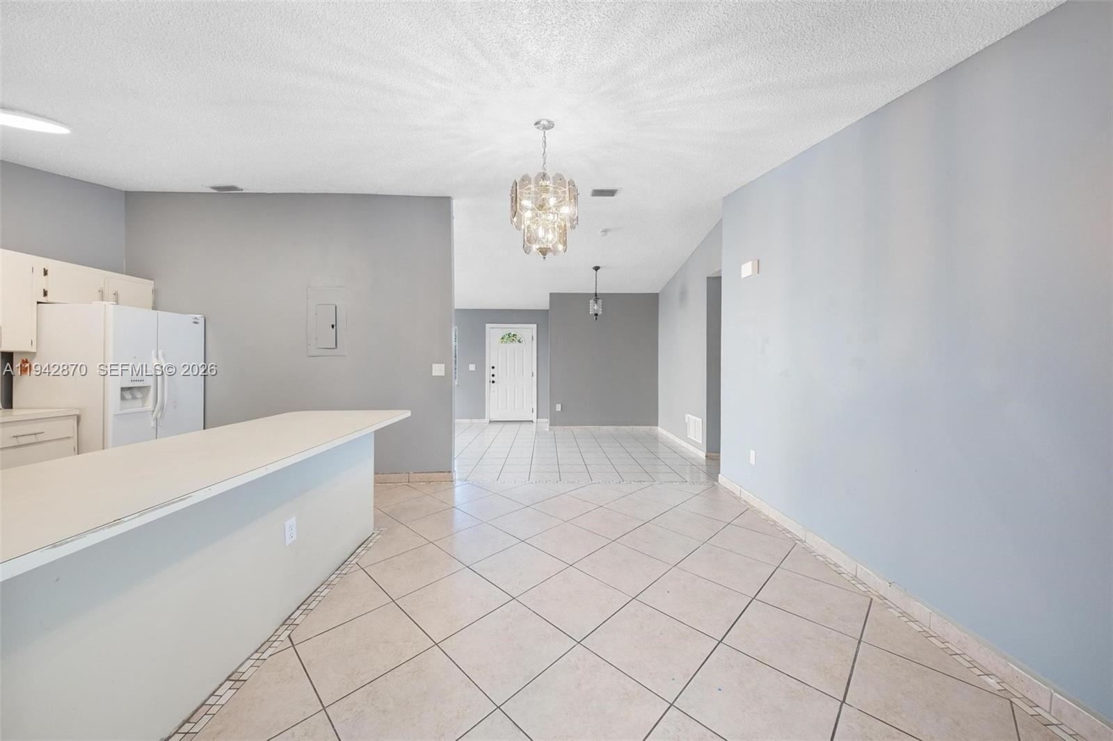 2348 Southwest 138th Place Miami, FL 33175 - Photo 11 of 35 a view of an empty room with a window