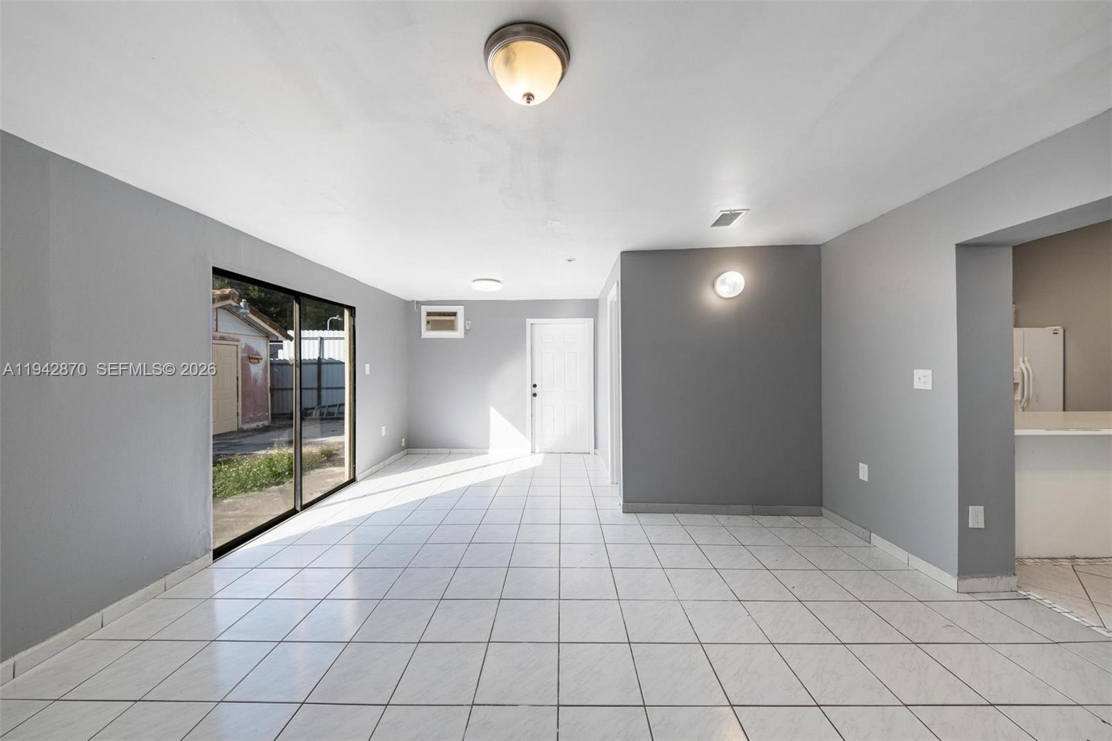 2348 Southwest 138th Place Miami, FL 33175 - Photo 20 of 35 a view of an empty room and window