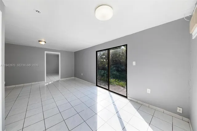 a view of an empty room with window