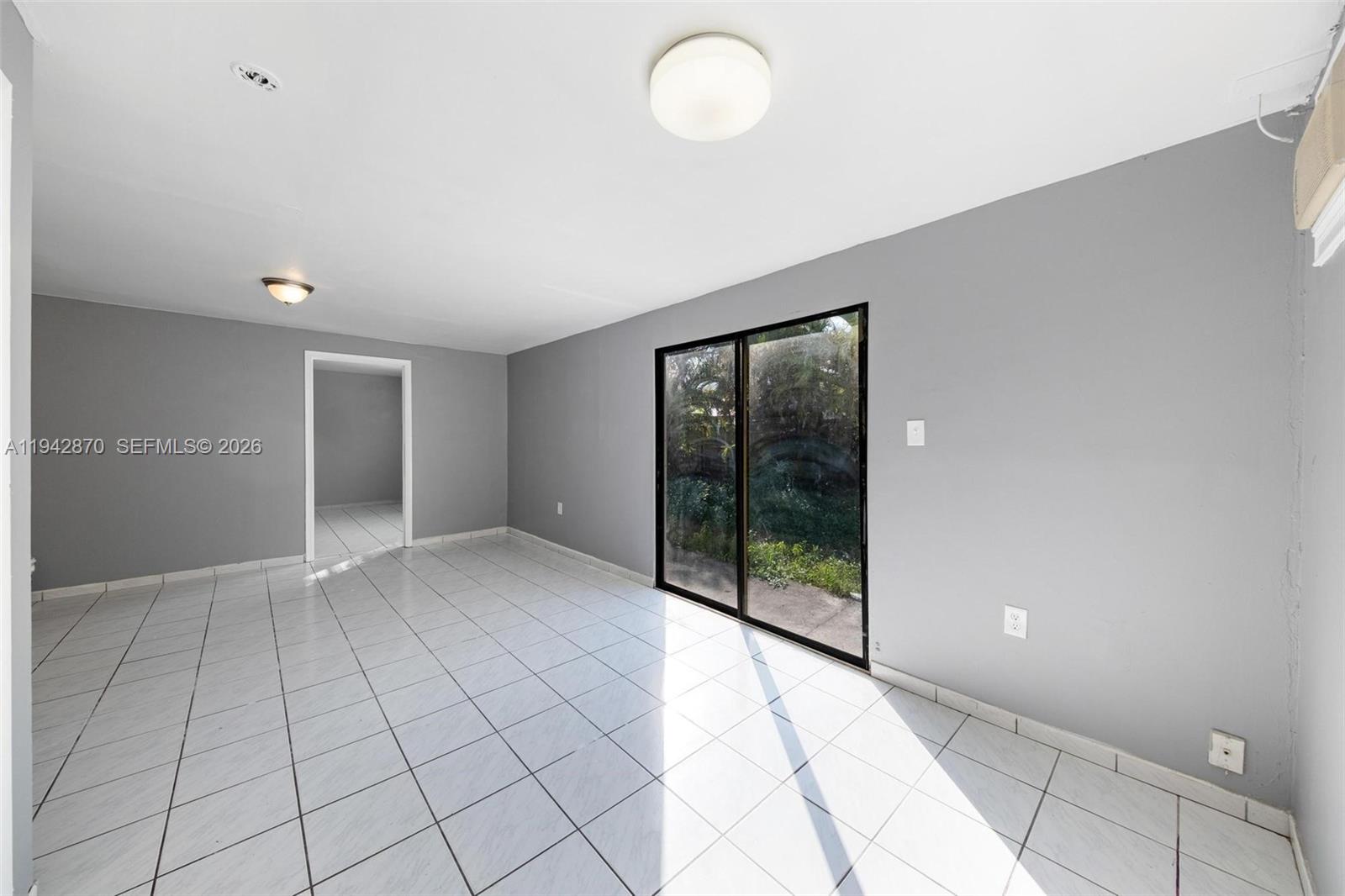 2348 Southwest 138th Place Miami, FL 33175 - Photo 24 of 35 a view of an empty room with window