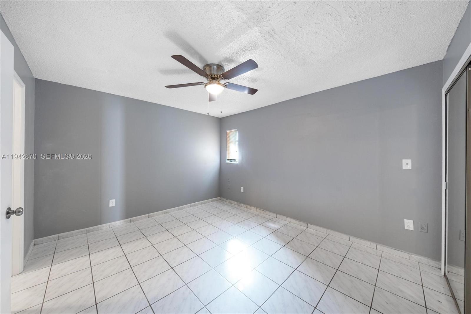 2348 Southwest 138th Place Miami, FL 33175 - Photo 26 of 35 a view of an empty room and window