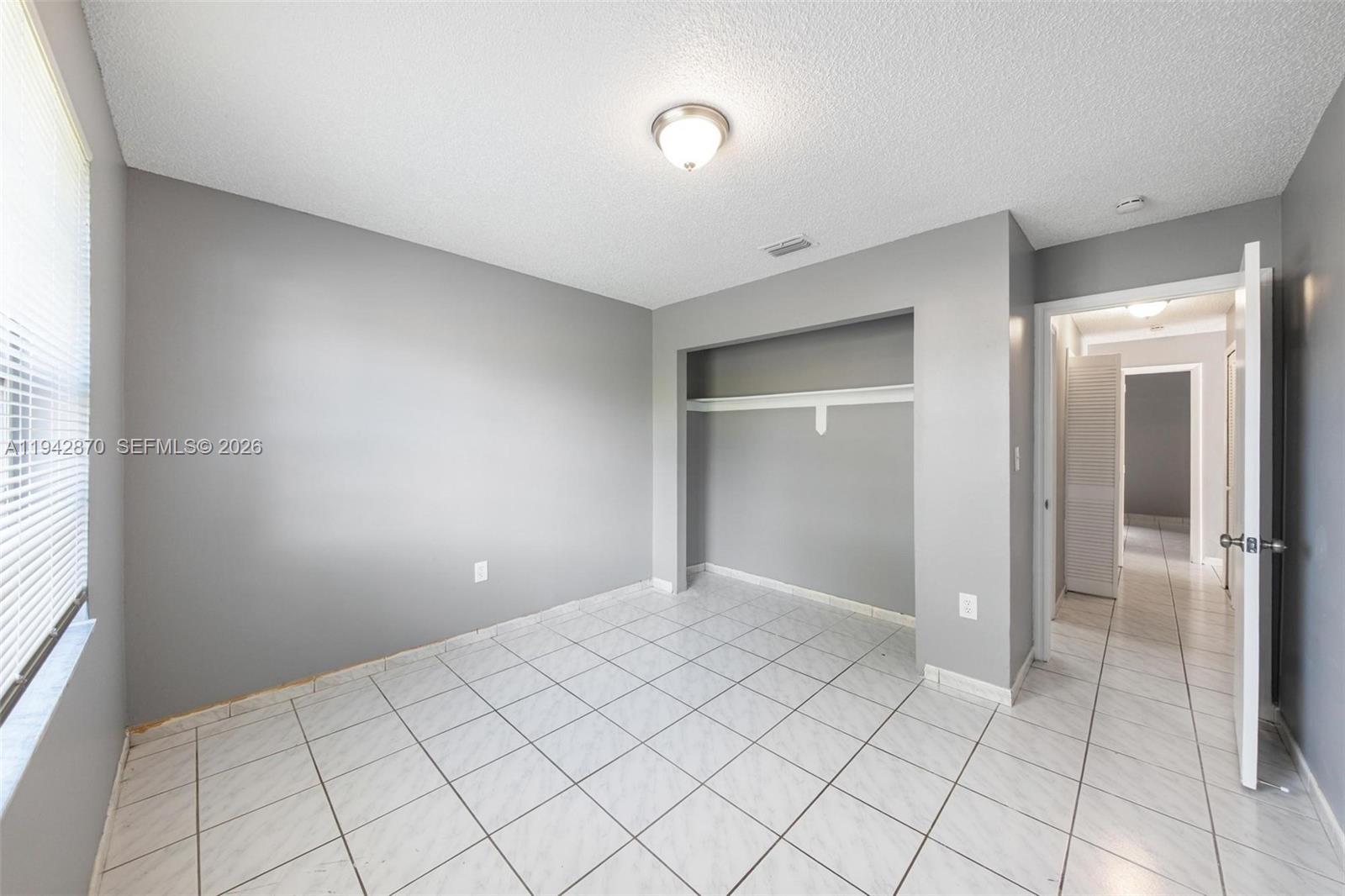 2348 Southwest 138th Place Miami, FL 33175 - Photo 31 of 35 a view of an empty room