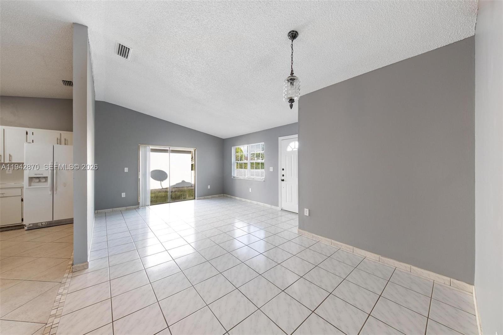 2348 Southwest 138th Place Miami, FL 33175 - Photo 8 of 35 a view of an empty room and window