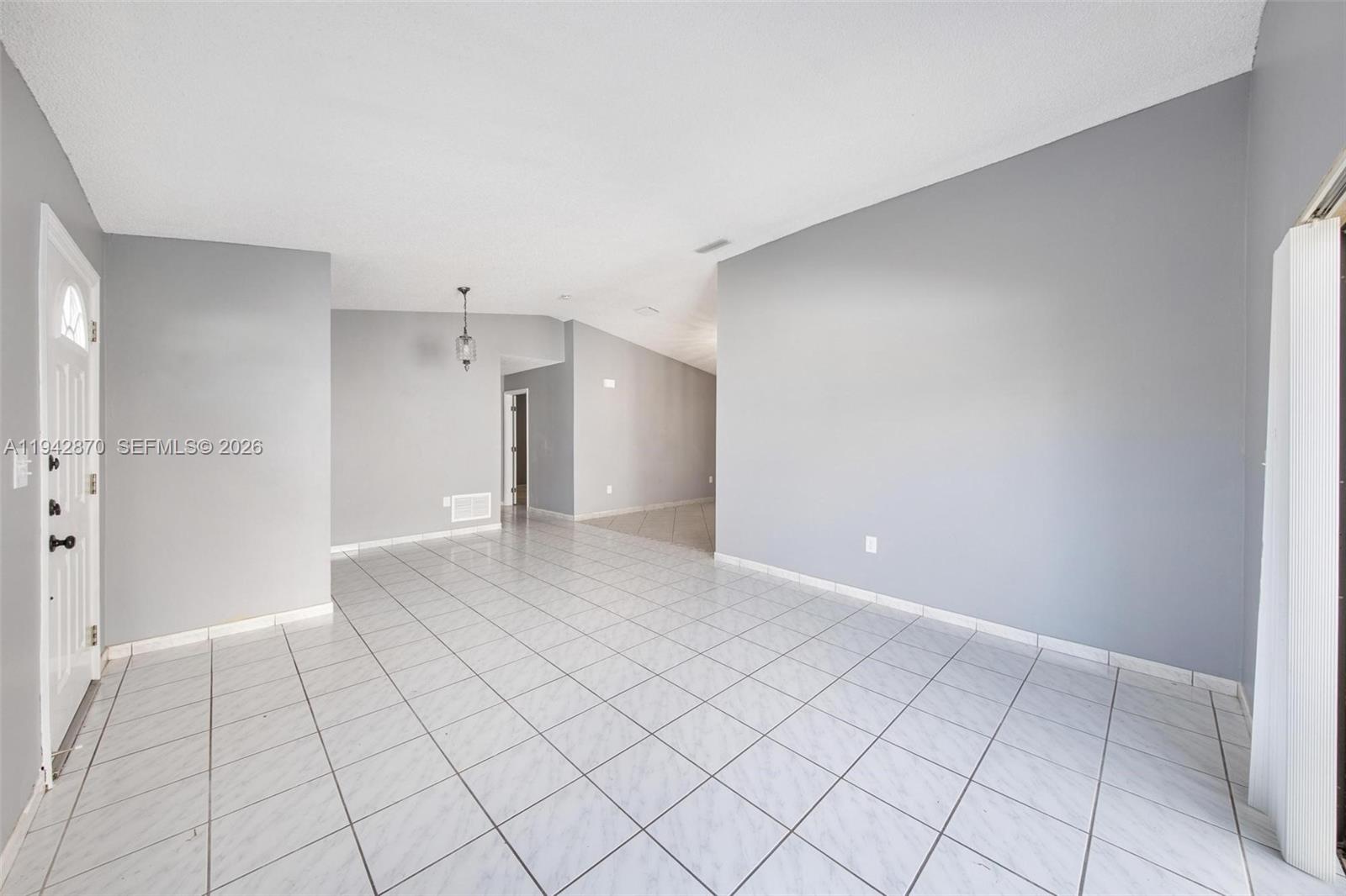 2348 Southwest 138th Place Miami, FL 33175 - Photo 10 of 35 a view of an empty room and window