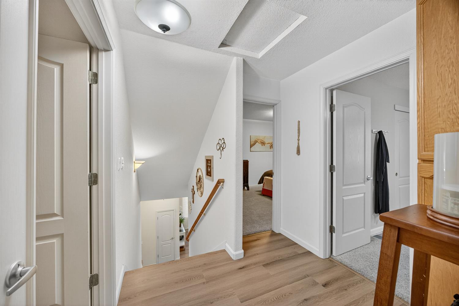 6113 Kifisia Way Fair Oaks, CA 95628 - Photo 38 of 67 a view of a hallway view with wooden floor and staircase