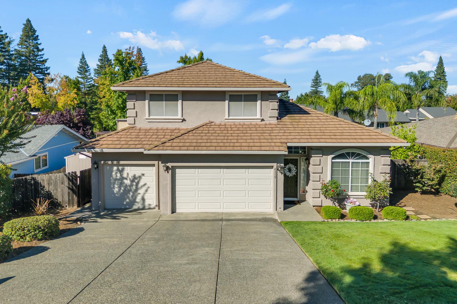 6113 Kifisia Way Fair Oaks, CA 95628 - Photo 56 of 67 a front view of a house with garden