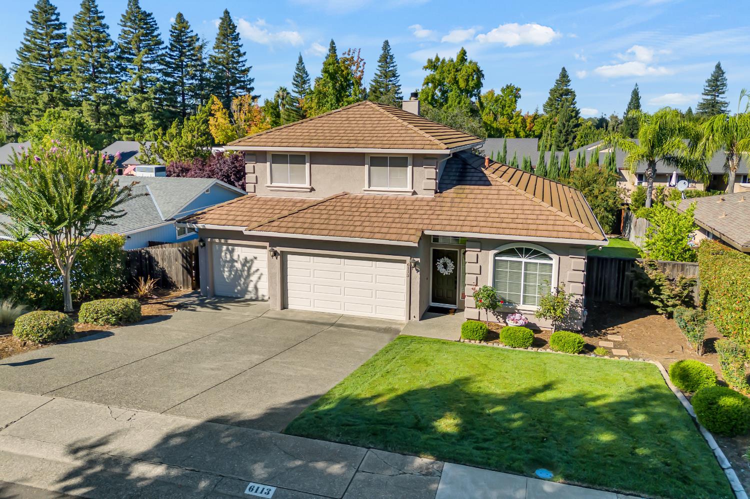 6113 Kifisia Way Fair Oaks, CA 95628 - Photo 57 of 67 a front view of a house with garden