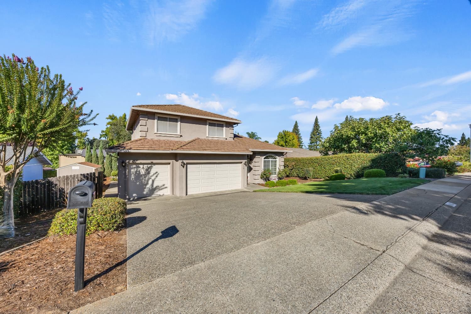 6113 Kifisia Way Fair Oaks, CA 95628 - Photo 58 of 67 a front view of a house with a yard