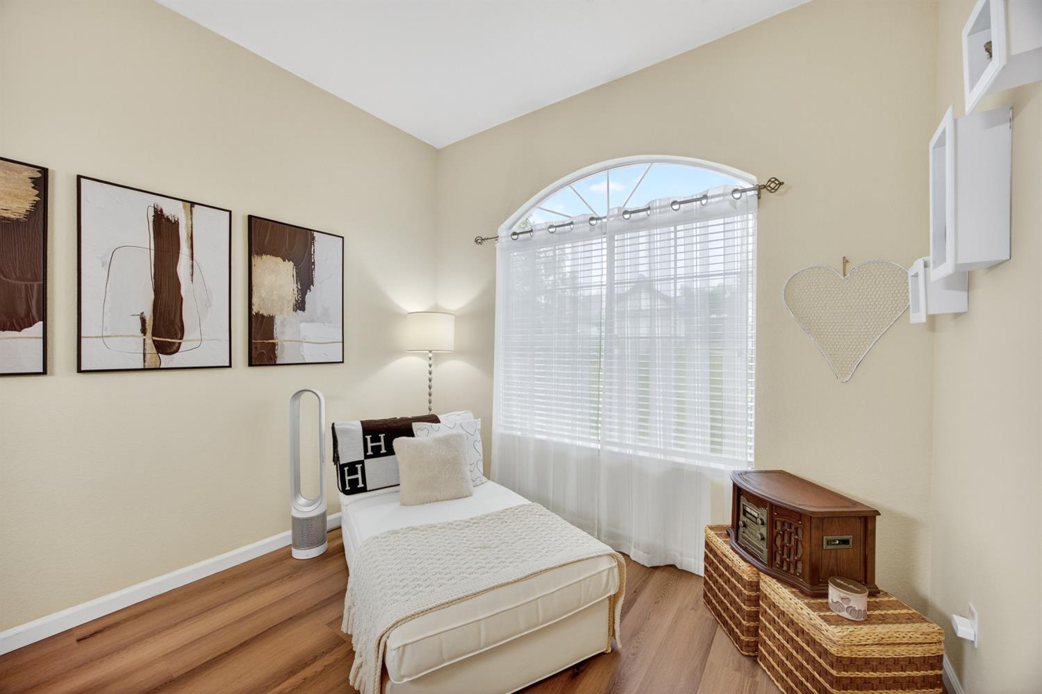 6113 Kifisia Way Fair Oaks, CA 95628 - Photo 6 of 67 a bedroom with a bed and wooden floor