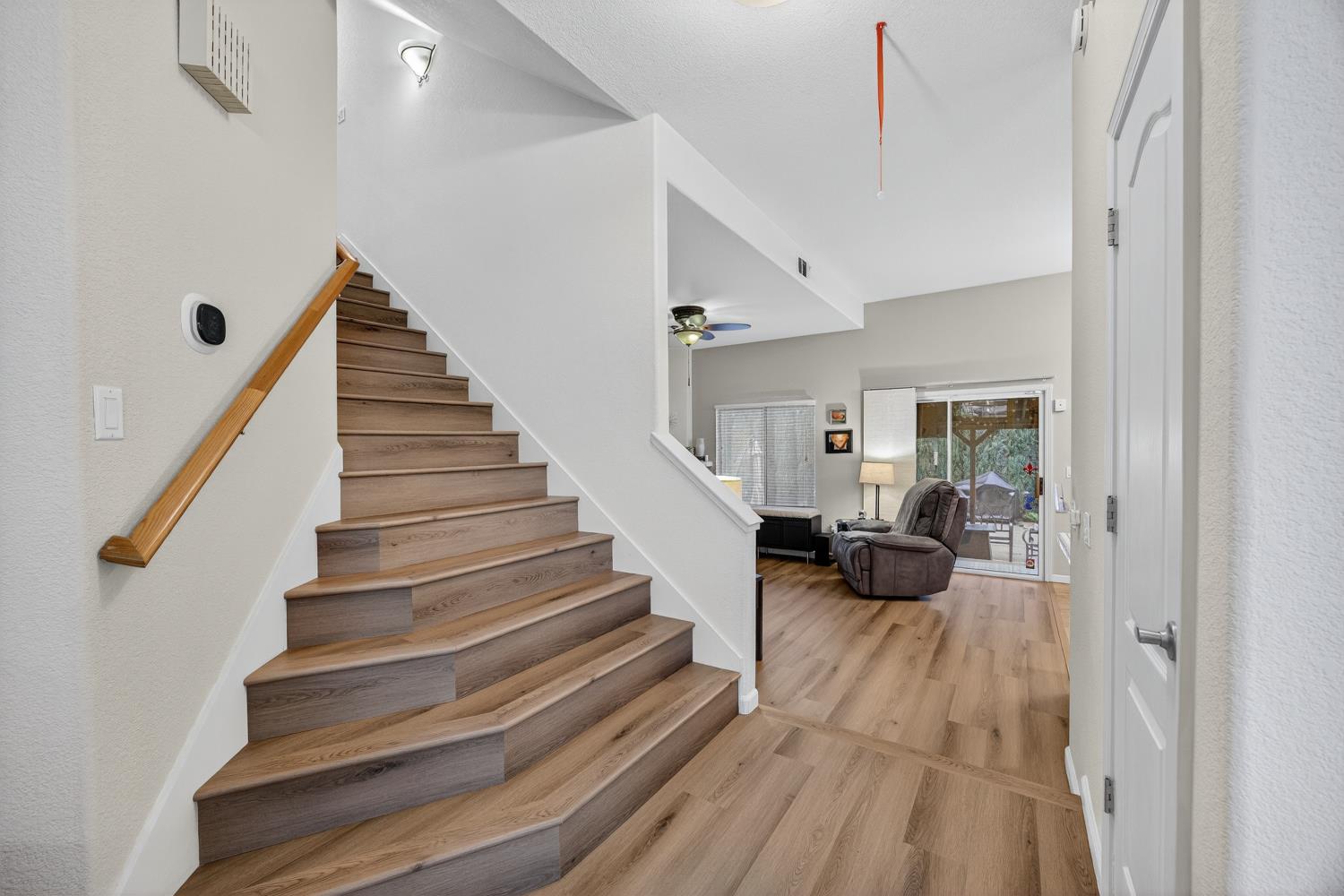 6113 Kifisia Way Fair Oaks, CA 95628 - Photo 7 of 67 a view of entryway livingroom and hall with wooden floor
