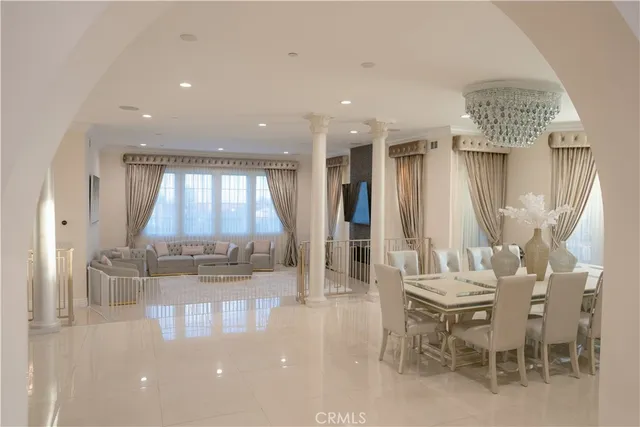 a dining room with furniture and window