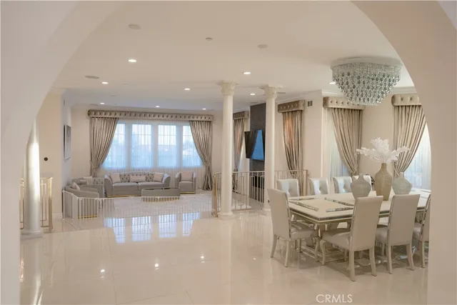 a dining room with furniture and window