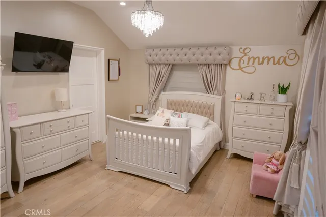 a bathroom with a sink vanity and mirror