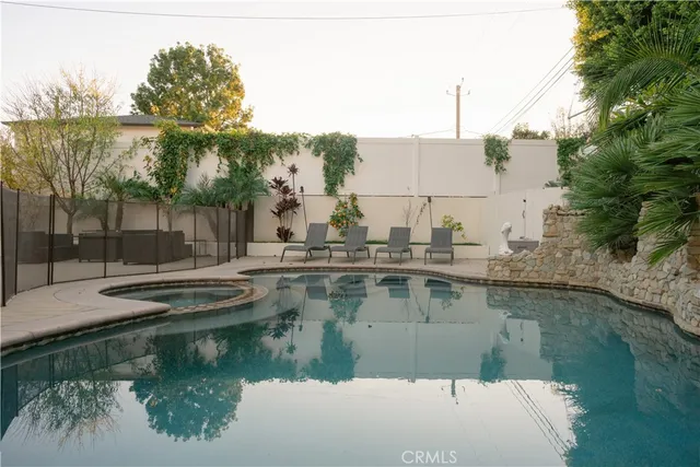 a view of a city with lush green forest
