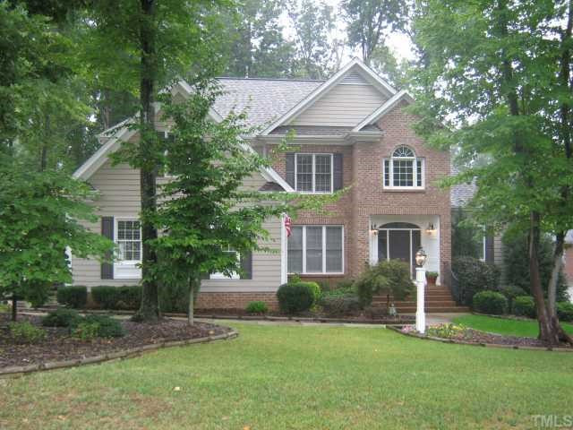 5201 Indigo Moon Way Raleigh, NC 27613 - Photo 1 of 12 Beautiful Custom Built Home in popular Bartons Creek! 3 Car Garage! Large lot! No City Taxes! Backyard backs to wodds and should stay that way! Custom landscaping and landscape lighting stays! Must see! 4 bedrooms, 3 fullbaths! Exterior Front