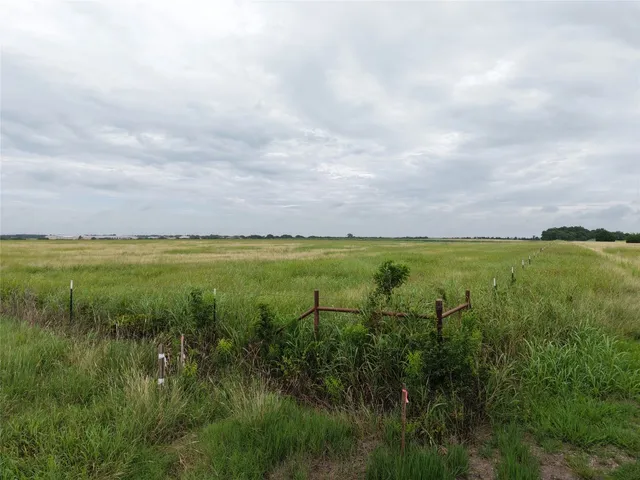 a view of a lake with a big yard