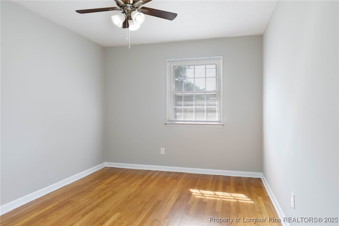 2419 Morganton Road Fayetteville, NC 28303 - Photo 23 of 44 an empty room with a window and ceiling fan